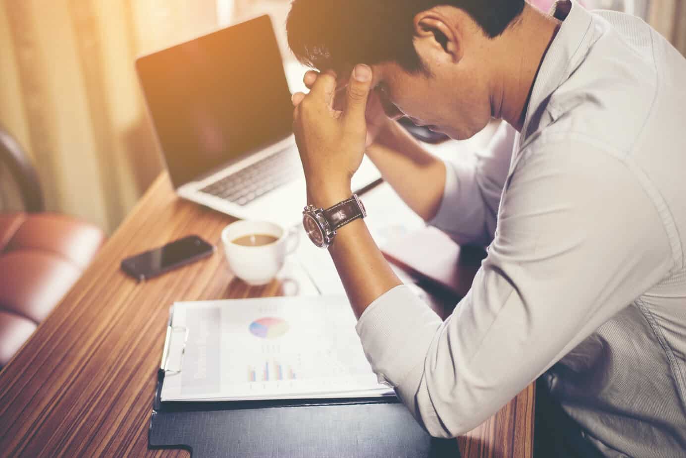 serious-businessman-working-with-analysis-financial-office (1)