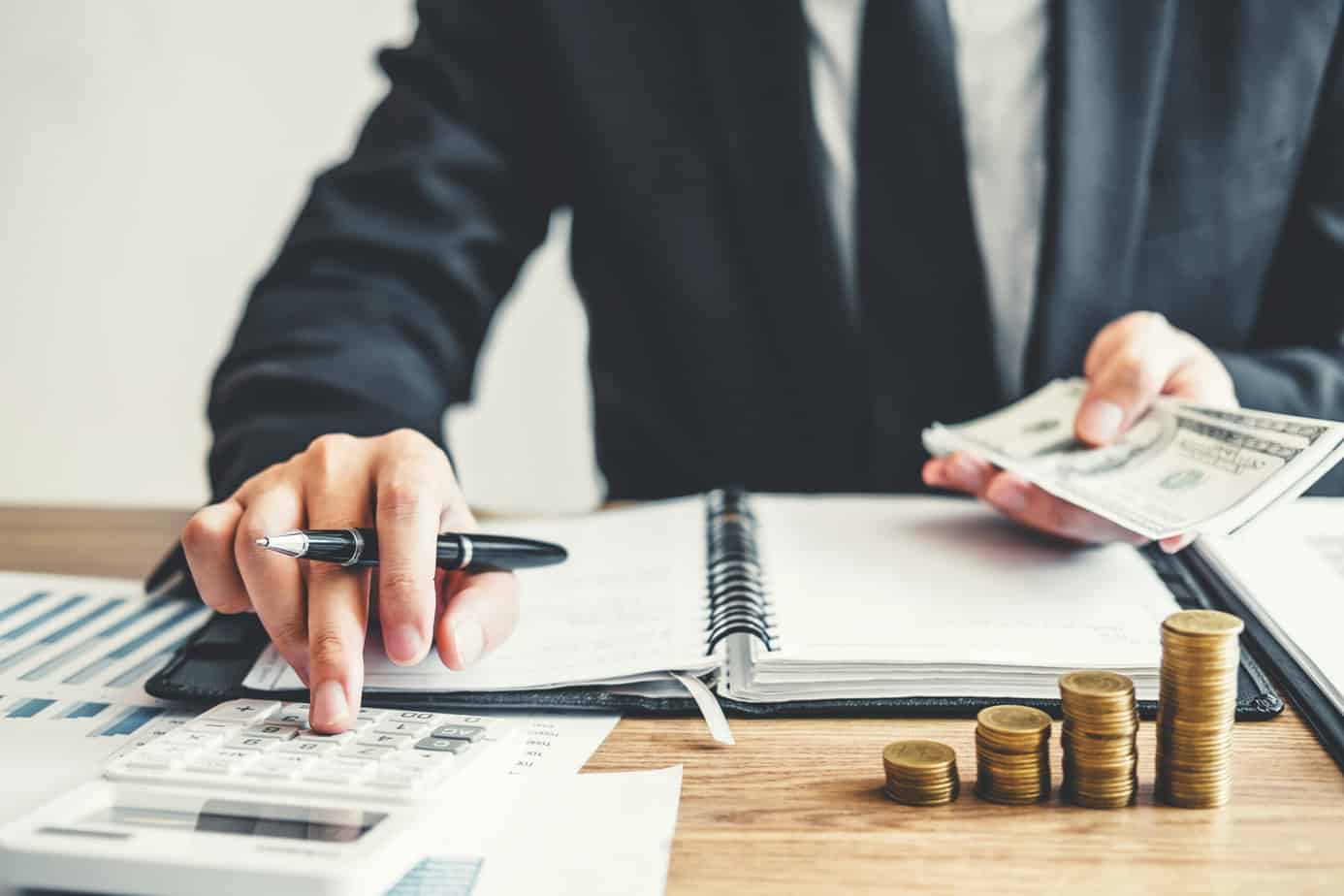 Business man Accounting Calculating Cost Economic budget investm Yonyou-FSM Cloud 1